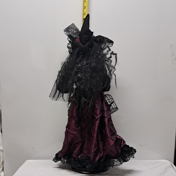Elegant Witch Doll with Black and Purple Dress